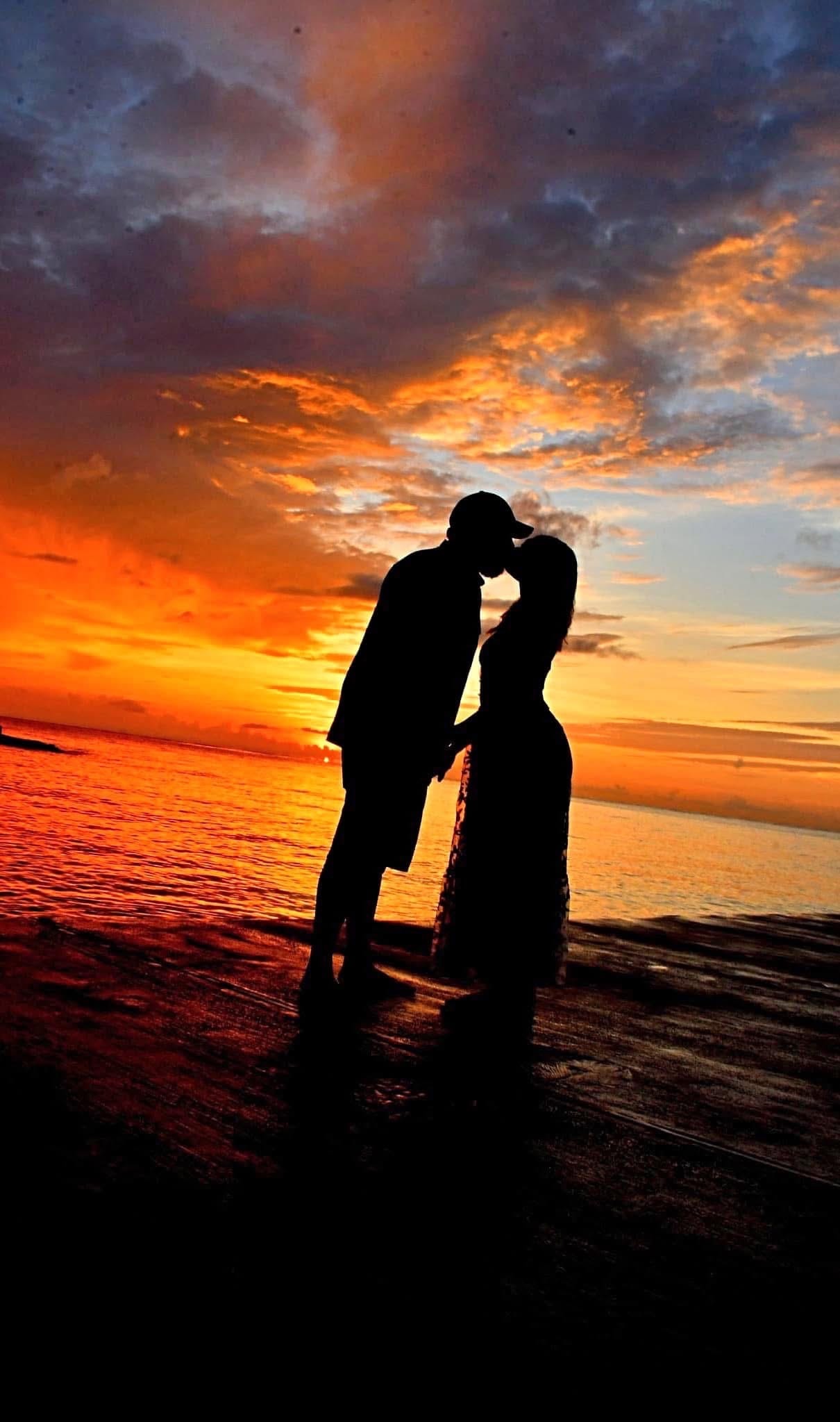 Romantic couple at sunset Santorini